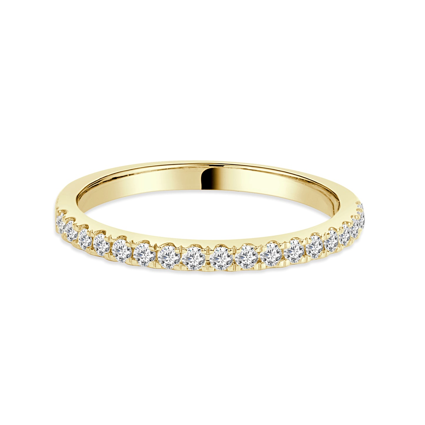 Gold wedding band with diamonds on a white background