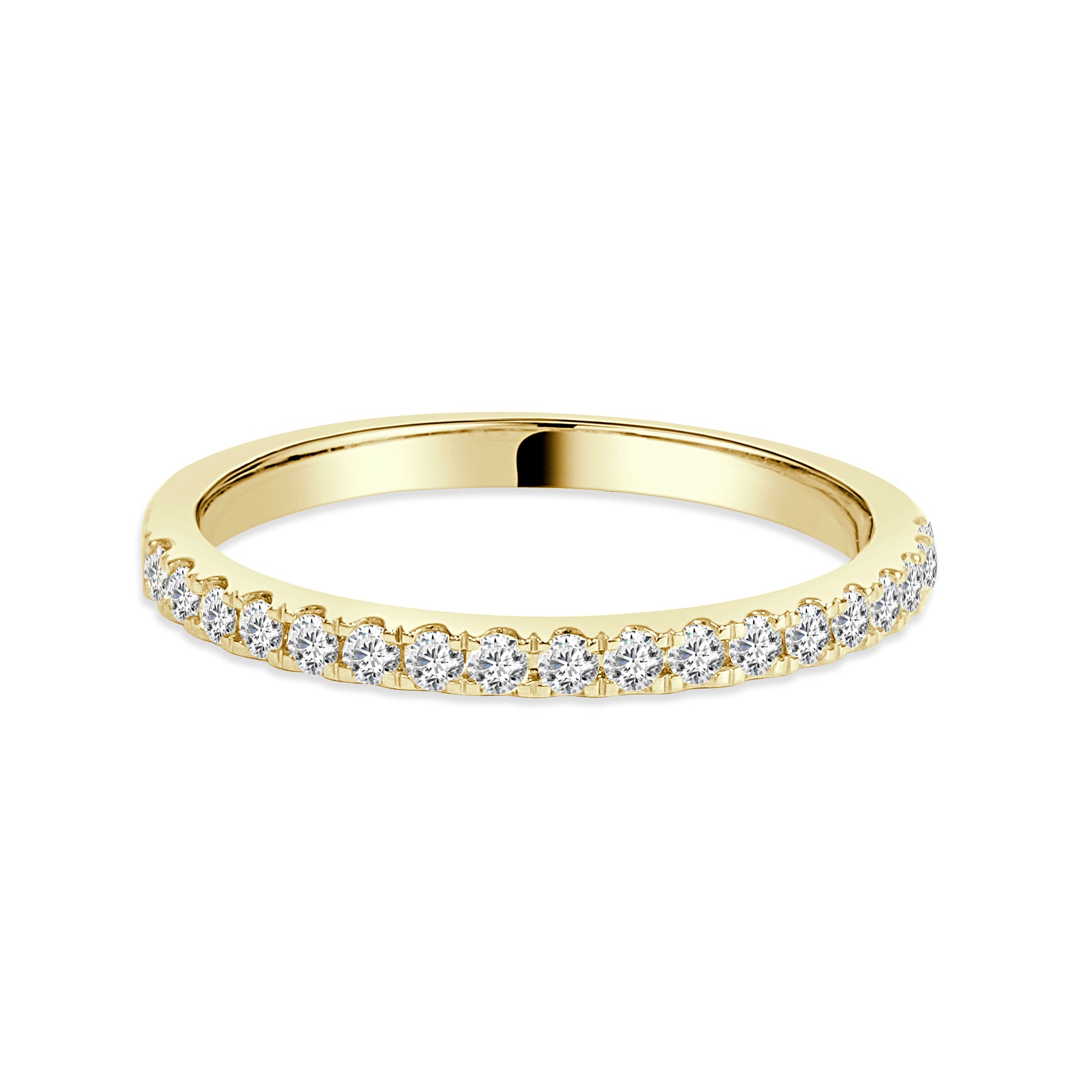 Gold wedding band with diamonds on a white background