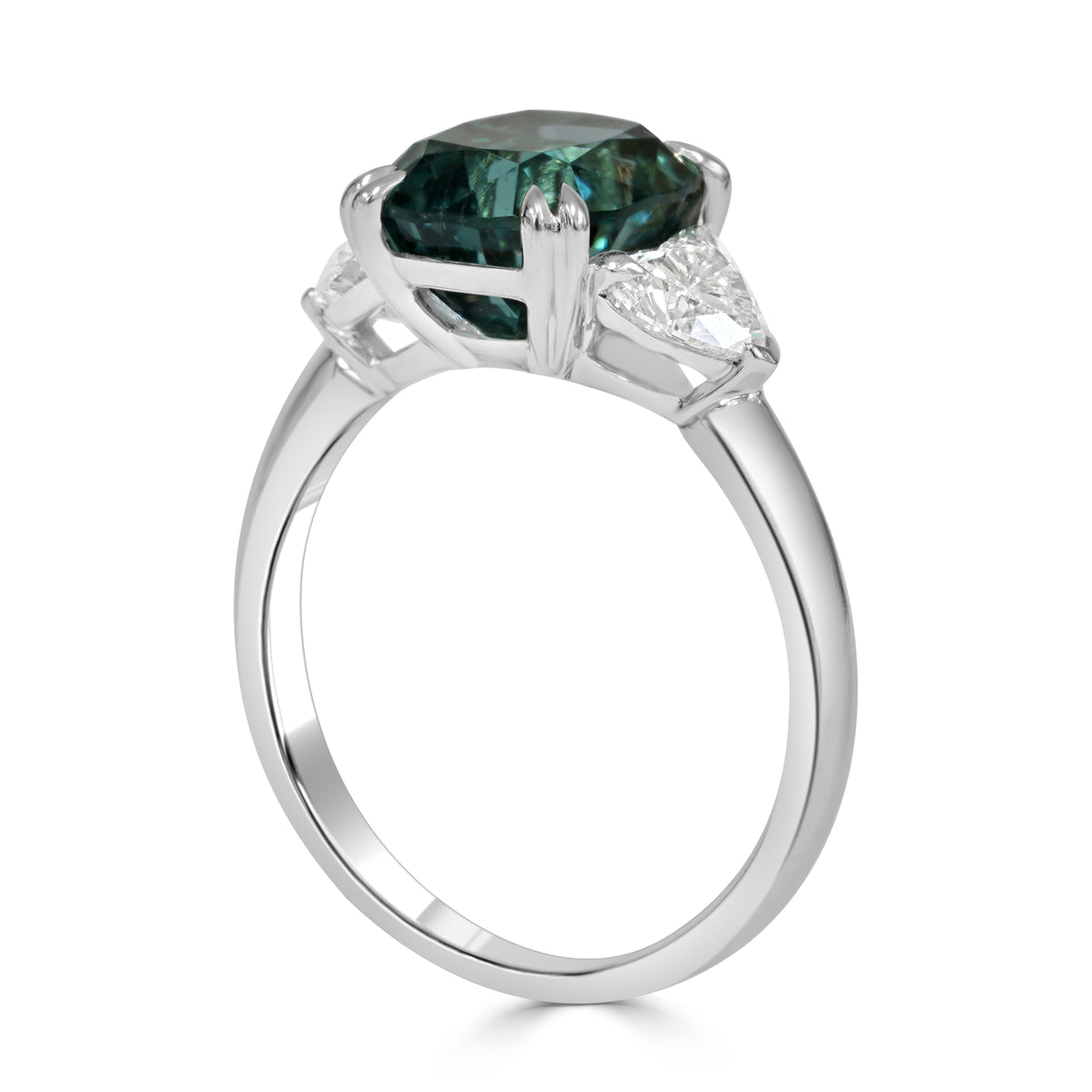 Lagoon Green Tourmaline set with 2 heart shape diamonds set in 18K White gold in a trilogy setting