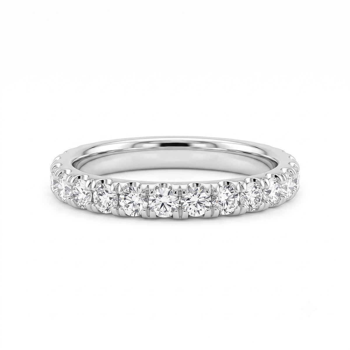 An 18K diamond wedding ring claw set with round brilliant-cut diamonds.