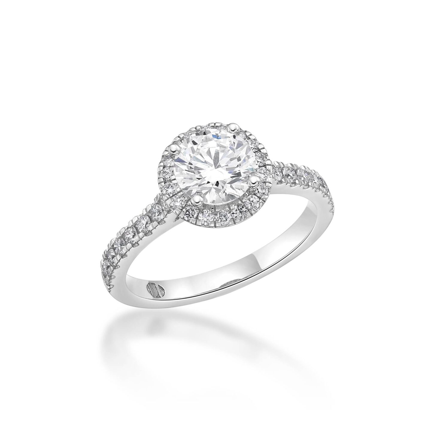 diamond ring with circular diamond set in and diamond band